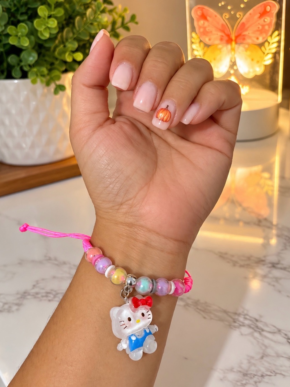 Hello Kitty Pink Cord Bracelet with White Hello Kitty Charm and Pastel Beads